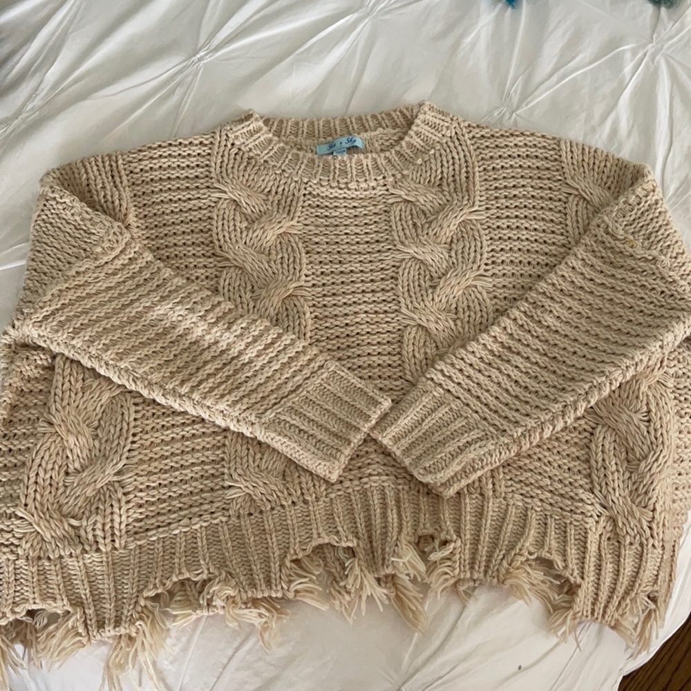 Woman’s chunky cable knit, tan sweater!